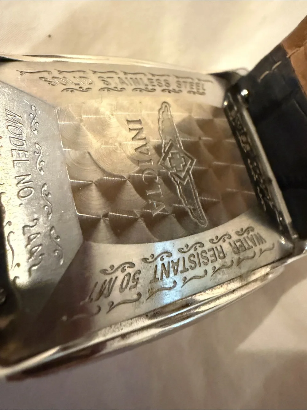 Invicta Men’s Silver Case Watch with Black Leather Strap Model 4224